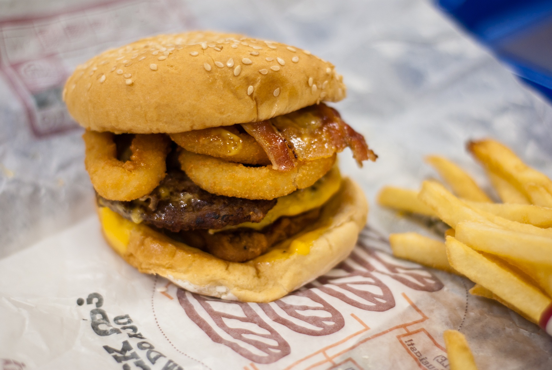 I noticed a trend in fast food restaurants nowadays - they just keep adding crap in the burger, then selling it for 2x it's regular price saying it's something new. So I figured I'd beat them to the punch this time; I ordered onion rings, nuggets, a bacon double stack and went to town. Oh, and I asked for a side of spicy mayo which I mixed with some ketchup and mayo, as the 'new special sauce'.