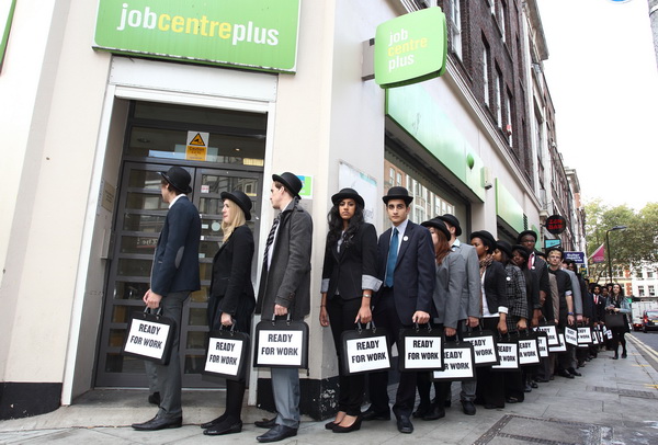 UK young unemployed congregate at job centre, London , jobless