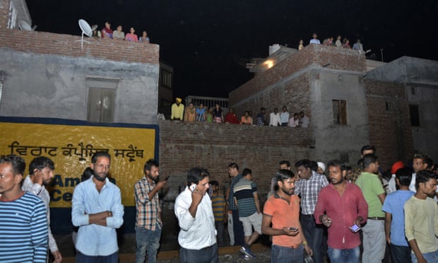 At least 50 dead as train hits crowd watching fireworks in India